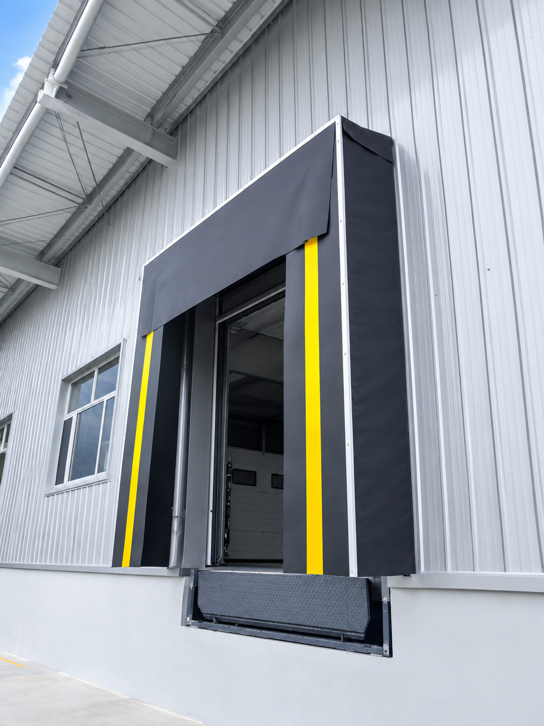 loading dock shelter for meat processing and food logistics facility