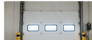 sectional door for beverage warehouse loading area