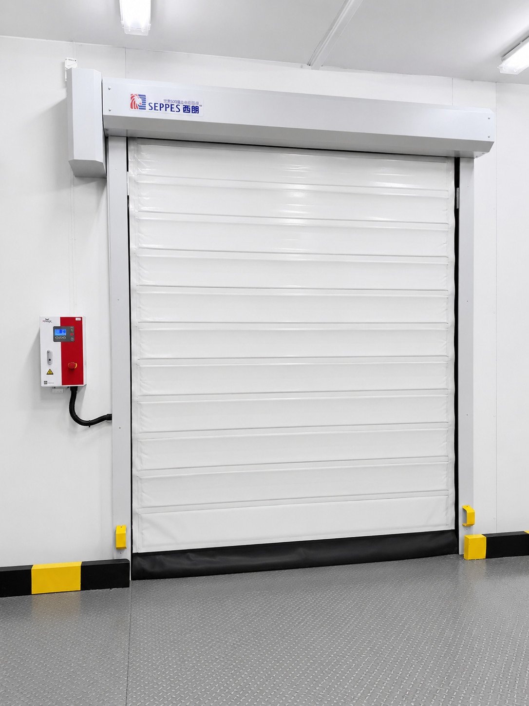 SEPPES high speed freezer door with insulated zipper curtain in a temperature-controlled industrial facility